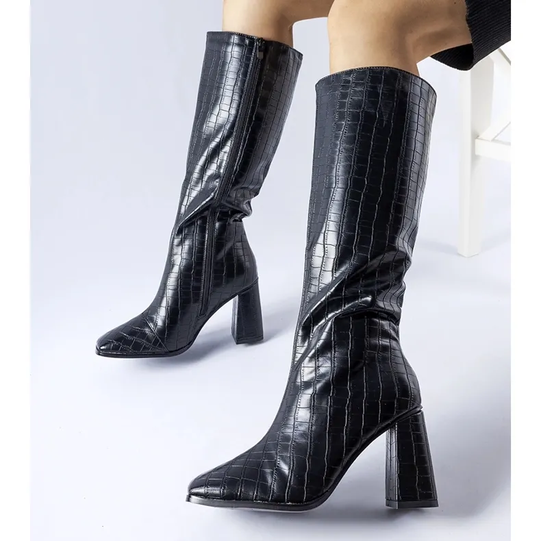 Black insulated high-heeled boots by Ferruccio